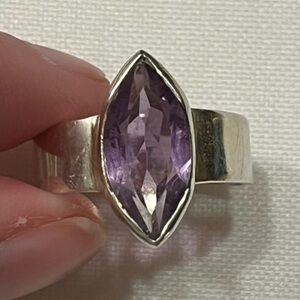 Sterling silver marquise purple stone ring
Size 8
Bold. Fun. Eye-catcher!